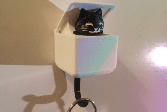 Cute Cat Motion Key Holder: A Whimsical Solution for Modern Organization